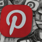 "Smartphone screen showing Pinterest’s interface with visually appealing pins, symbolizing Pinterest's rise among social media stocks and unique e-commerce blend."