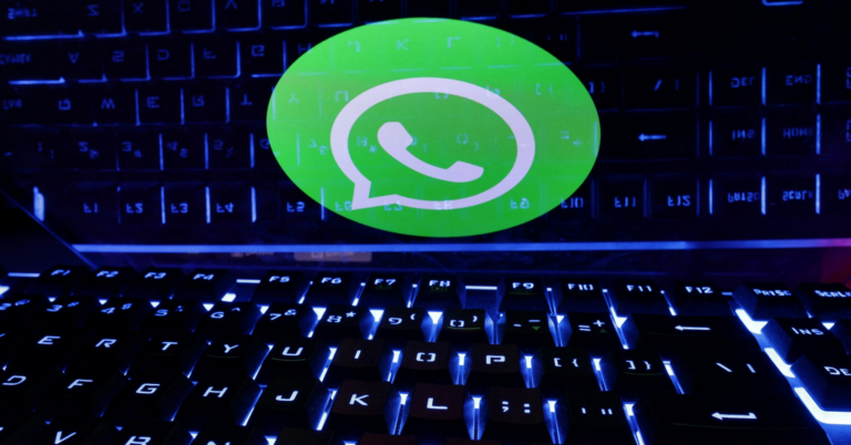 Alt Text: "Close-up of a smartphone displaying a suspicious chat, symbolizing WhatsApp spyware hacking accusations and cybersecurity concerns."